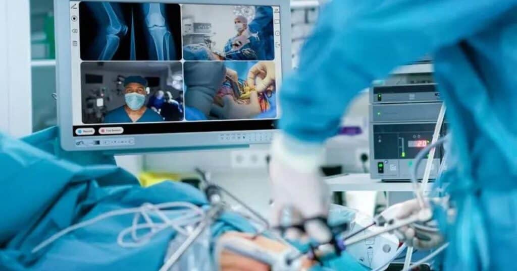Surgeons using telepresence technology in the operating room.